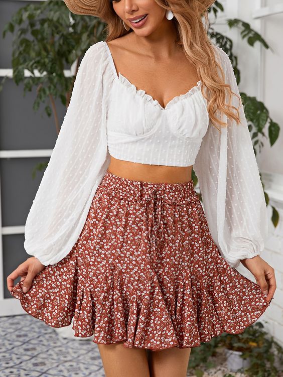 Fun and flirty Ruffle crop top with a floral mini skirt